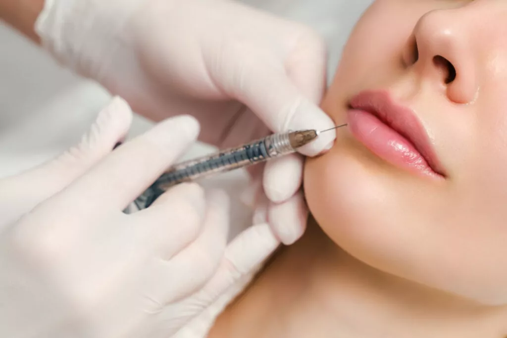 lip augmentation correction procedure cosmetology salon specialist makes injection